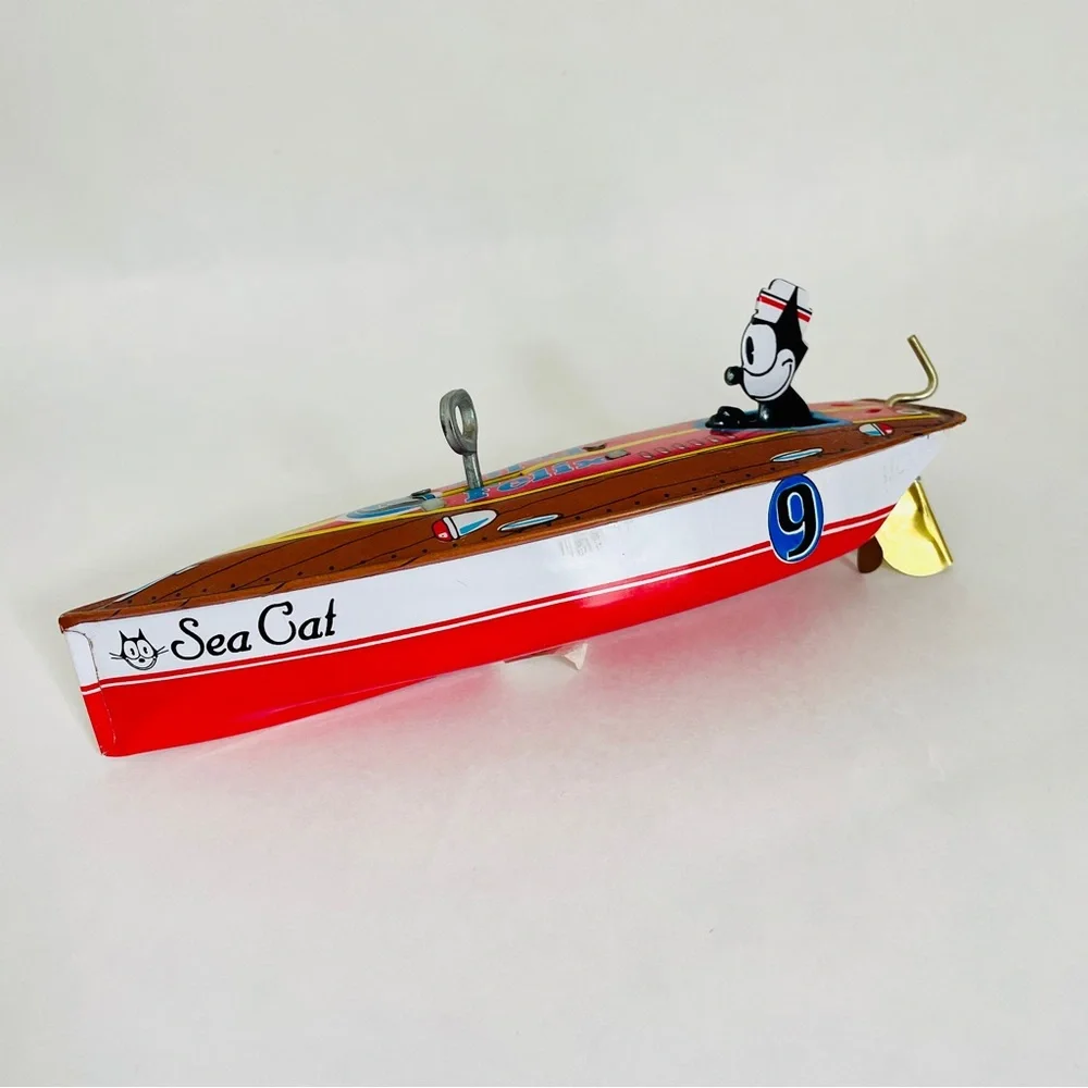 Schylling Felix the Cat Tin Speedboat Toy Red and Blue
